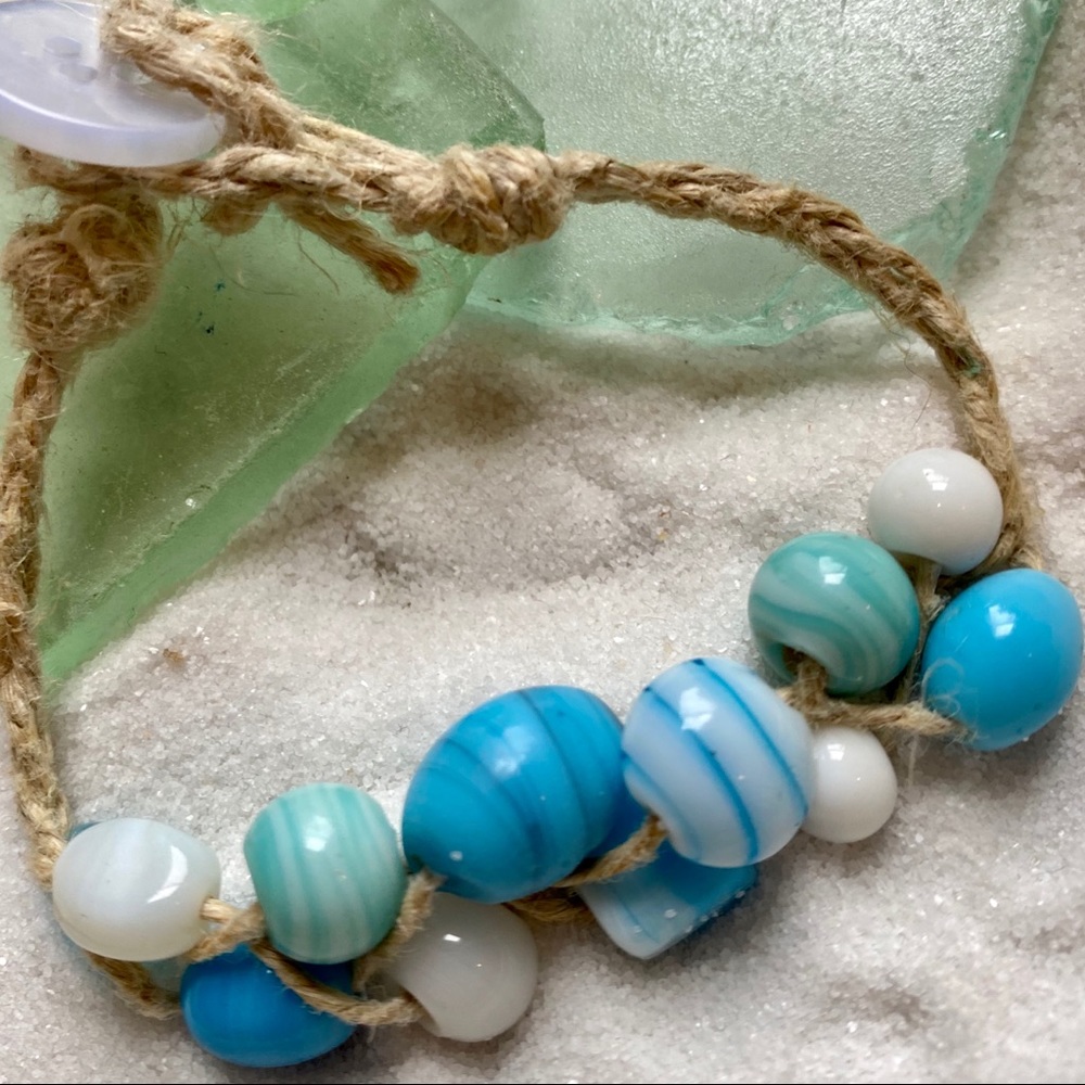 Handcrafted blue and white bead hemp bracelet.